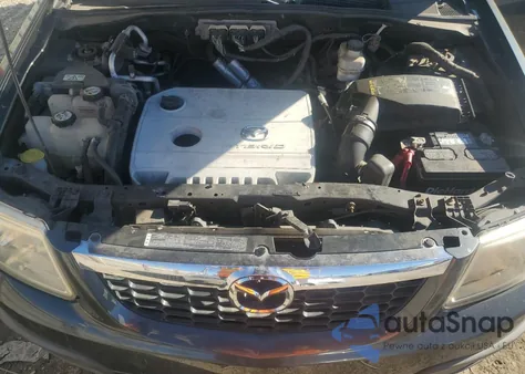 2009 Mazda Tribute Hybrid z USA, uszkodzony, nr VIN 4F2CZ49319KM07138